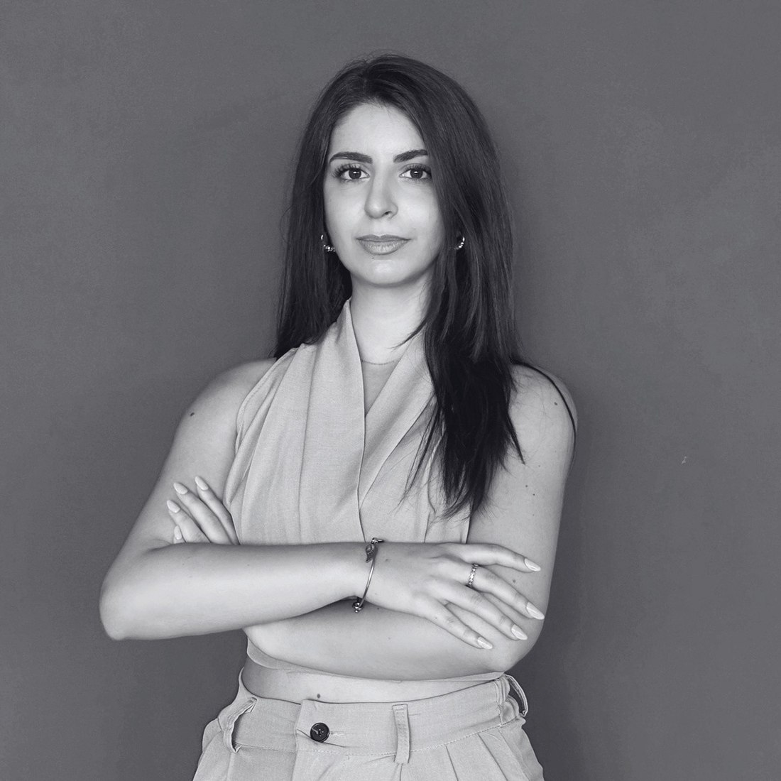 Portrait of Elena Vargas, arms crossed